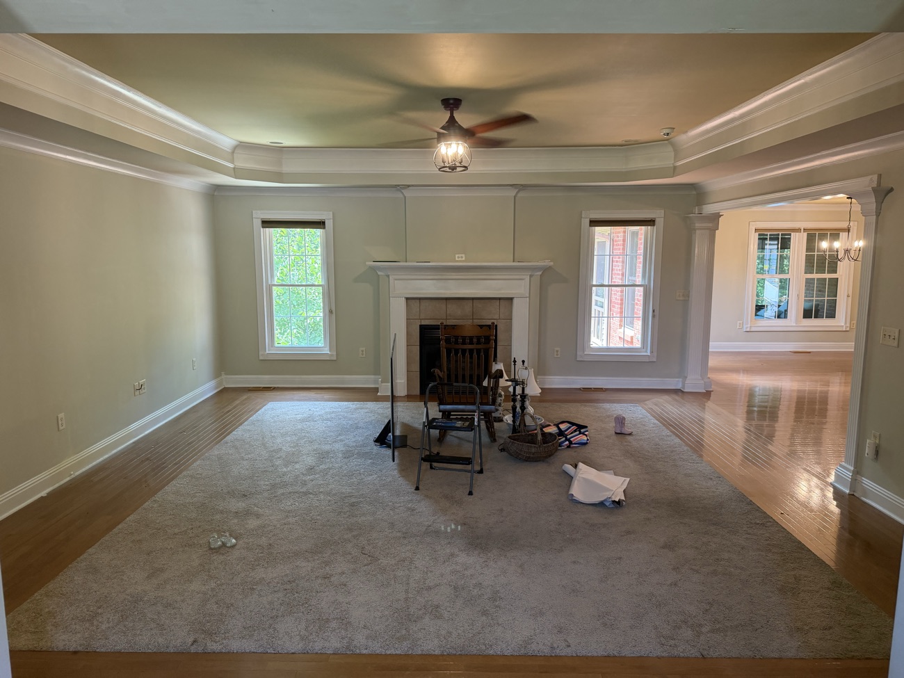 A large living room cleared out after a property cleanout, ready for the final sweep.